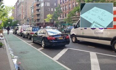 Cops from the 20th Precinct park their personal vehicles in a left turn lane on Columbus Avenue, causing danger and congestion. Photo: Streetsblog