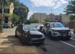 The crashed car at Vanderbilt and Lafayette. Credit: Streetsblog