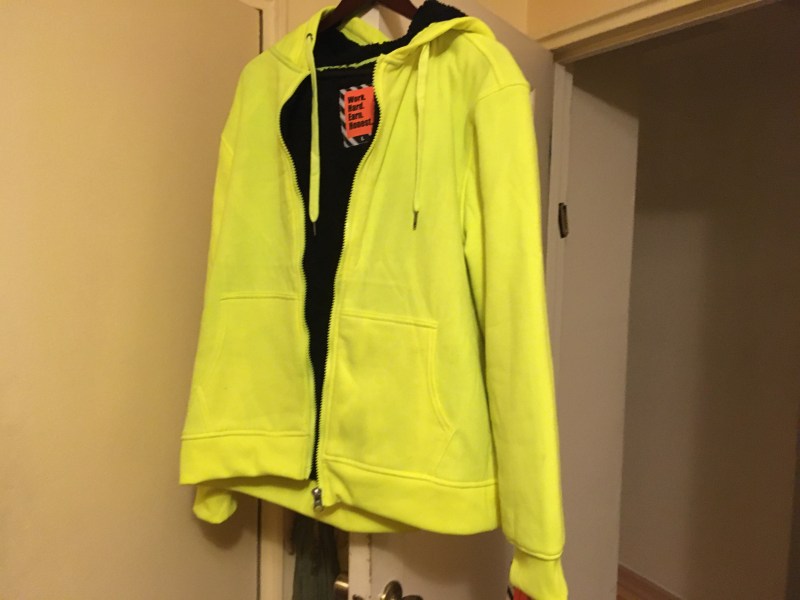 Introducing the NYC "pedestrian condom" — a neon yellow hoodie. Photo: Eve Kessler