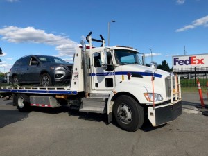 Sight for sore eyes: The MTA tows away a car belonging to a recidivist scofflaw. Wouldn't it be great if the city could do that more often? Photo: MTA Bridges and Tunnels