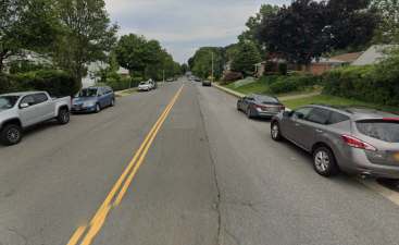 The DOT didn’t think that super-wide 46th Avenue was appropriate for a protected bike lane, but Community Board 10 did. Photo: Google