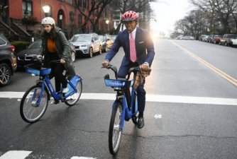 Mayor Adams on an electric Citi Bike last year — a device that is not legal in city parks. But that will change this summer.