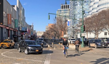 As you can see, cyclists are squeezed between two wide roads at the Chelsea Piers — the complex's driveway (left) and West Street (right). Photo: Charles Komanoff