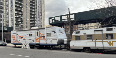 These two derelict RVs have been parked in front of 551 W. 178th St. for a long time — the one on the left apparently since 2016, locals have complained. Photo: Eve Kessler