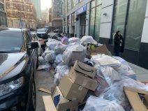 Welcome to New York, where pedestrians walk amid leaking, stinking garbage bags.