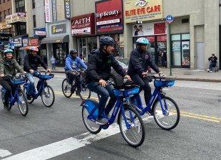 Mayor Adams and Department of Transportation Commissioner Ydanis Rodriguez led a pack of activists on an Earth Day ride through Downtown Brooklyn and over the Brooklyn Bridge on Saturday. Photo: Mark Gorton