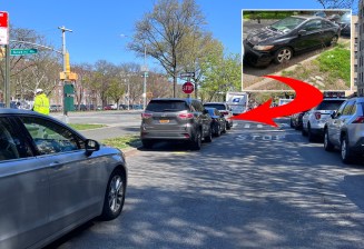 It doesn't look like much, but Streetsblog got one abandoned car towed this week from a spot on Ocean Parkway (arrow).
