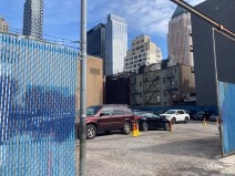 Look at that neighborhood character! Residents are pushing back against an affordable housing development proposed for this MTA parking lot at the corner of 54th Street and Ninth Avenue in Hell's Kitchen. Photo: Julianne Cuba