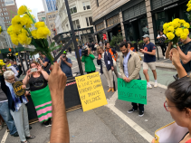 Marchers observed a moment of silence on broadway at the spot of Monday's horrendous crash. Photo: Gersh Kuntzman