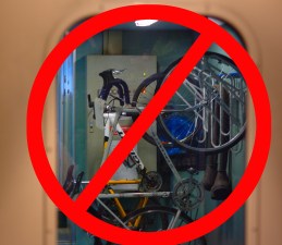Bikes on a rack on an Amtrak train in the Pacific Northwest. Photo: Will Value with help from the Streetsblog Photoshop Desk