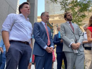 Assembly Member Robert Carroll (left), Manhattan Borough President Mark Levine (center) and State Senator Andrew Gounardes (right) at a rally for congestion pricing on Thursday. Photo: Dave Colon
