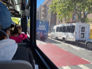 The Bx3 bus can't ride in its brand-new priority lane because of a parked Bud Light truck. Photo: Eve Kessler