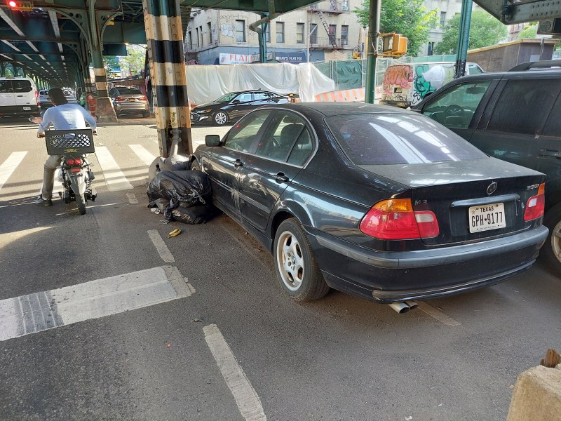 The city is eyeing 10th Avenue in Inwood for a protected bike lane that would help fill the gap of the Manhattan greenway at the northern tip of the borough. Photo: Tipster