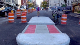 Charlie Todd of Improv Everywhere shows off the future of Ninth Avenue. Photo: Clarence Eckerson Jr.