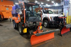 A bike lane snow plow at DSNY's Spring Street garage. Photo: Kevin Duggan