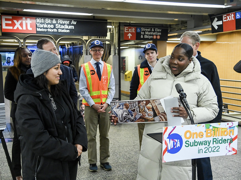 The MTA's Acting Chief Customer Officer Shanifah Rieara presents Bronx resident Sasha Salazar with a gift for being the one billionth subway rider of 2022. Photo: Marc A. Hermann/MTA