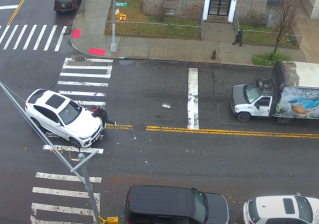 A reckless driver strikes a pedestrian with the light and in the crosswalk in Bath Beach. Photo: YouTube