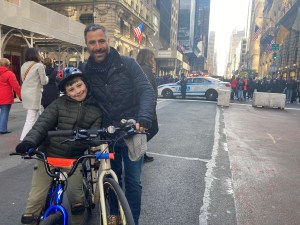 Daniel and his son Jules enjoying Fifth Avenue. Photo: Julianne Cuba