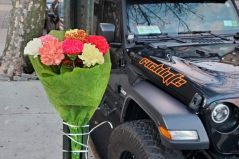 Someone installed a bouquet near the crash site on 24th Avenue, seen a day after the crash. Photo: Cristina Furlong