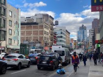 Canal Street's heavy midday traffic snakes through Chinatown. Photo: Kevin Duggan