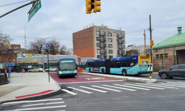 A wider sidewalk and a dedicated bus lane on Westchester Avenue in the East Bronx, where the MTA and DOT recently made bus priority improvements as part of the Boogie Down's bus network redesign. Photo: DOT