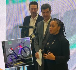 Bike NY CEO Ken Podziba, DOT Commissioner Ydanis Rodriguez and Deputy Mayor Sheena Wright discuss the new initiative. Photo: Henry Beers Shenk