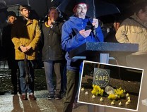 Lev Fruchter, the son of Norman Fruchter and Rachel Fruchter, both of whom were killed in road violence 25 years apart, spoke at a vigil for his father in Bay Ridge on Thursday night. Behind him are (left) State Sen. Andrew Gounardes and Comptroller Brad Lander. Photo: Bobby Preti