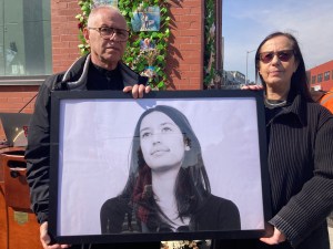 The parents of Sarah Schick, Evelyne (right) and Pierre Schick, during a press conference at the site where their daughter was killed on Monday. Photo: Julianne Cuba