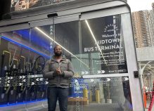 Oonee CEO Shabazz Stuart in front of the newest addition to the Port Authority: Secure bike parking. Photo: Dave Colon