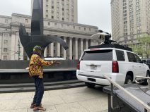 Lorenzo Pace, who created the "Triumph of the Human Spirit" monument in Foley Square, can't believe his eyes. Photo: Gersh Kuntzman