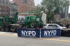 A flatbed truck driver struck a pedestrian on E. 125th Street in East Harlem on May 24. Screenshot via Citizen App.