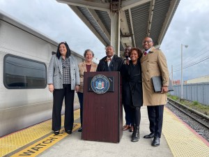 The Far Rockaway delegation (from left: City Council Member Joann Ariola, Assembly Member Stacey Pheffer Amato, State Senator James Sanders, Jr., Assembly Member Khaleel Anderson, City Council Member Selvena Brooks-Powers and Queens Borough President Donovan Richards) is all smiles thanks to a new fare discount on the LIRR. Photo: Dave Colon