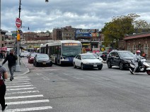 See no evil: A BX9 bus gets boxed out of the bus lane on Fordham road. Photo: Dave Colon