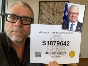 Here's my Georgia tag and its rightful owner, Georgia Department of Revenue Commissioner Frank O'Connell.