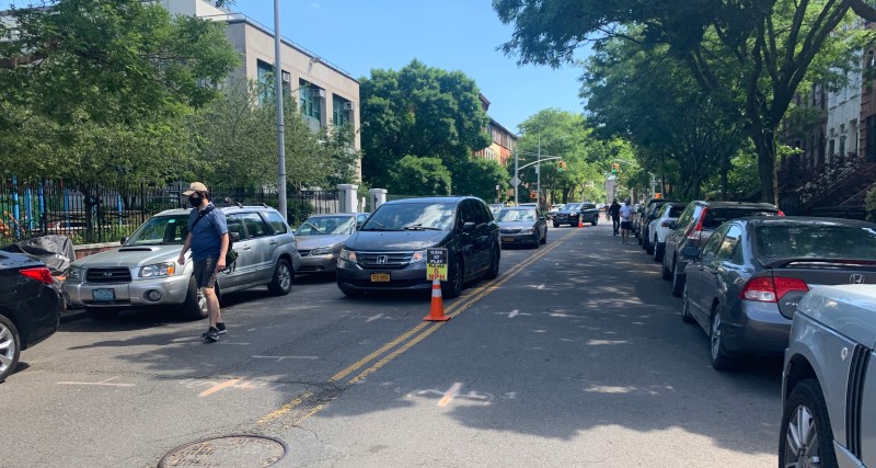 Cars are cars, all over the world. And especially on narrow Underhill Avenue. File art